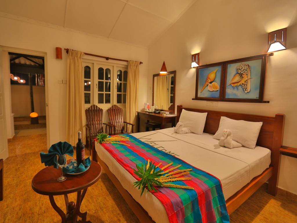 Thejan Beach Cabanas Бентота Номер фото
